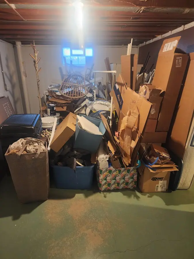 Roll-off dumpster container at job site for 2 Yard Dumpster Rental in Grants Pass